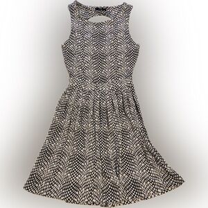 Tart Pleated A-Line Dress with cutouts on back